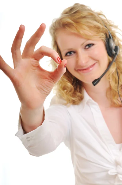 Zakelijke blonde vrouw met hoofdtelefoon — Stockfoto