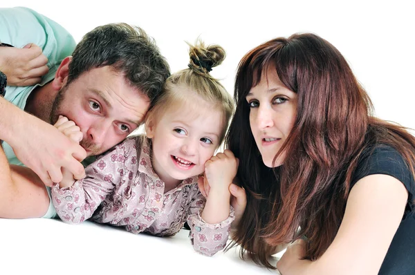 Happy young family together in studio — Stock Photo, Image