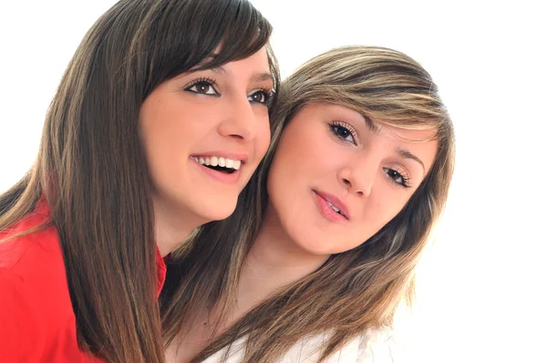 Két fiatal lány, elszigetelt fehér — Stock Fotó