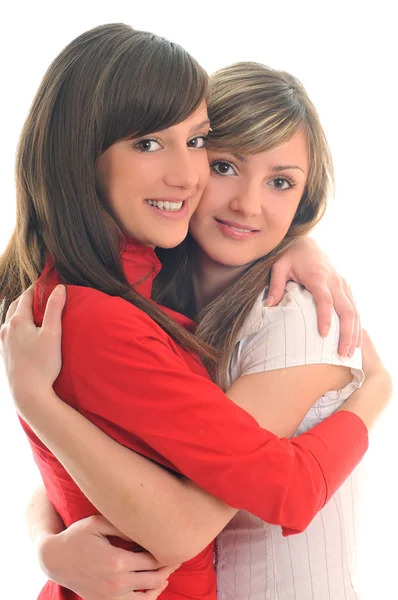 Дві молоді дівчата ізольовані на білому — стокове фото
