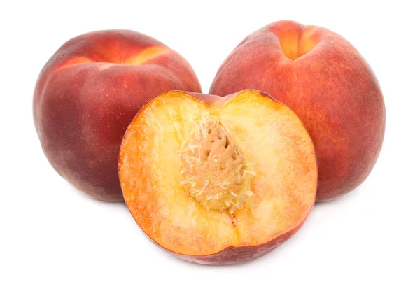Högen av mogna persikor — Stockfoto