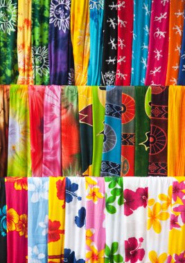 Assortment of colorful sarongs clipart