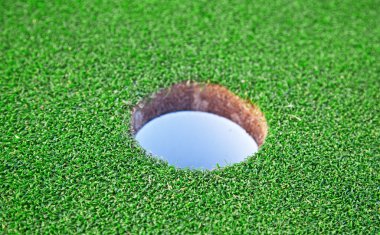 Golf Hole with shallow depth of field clipart