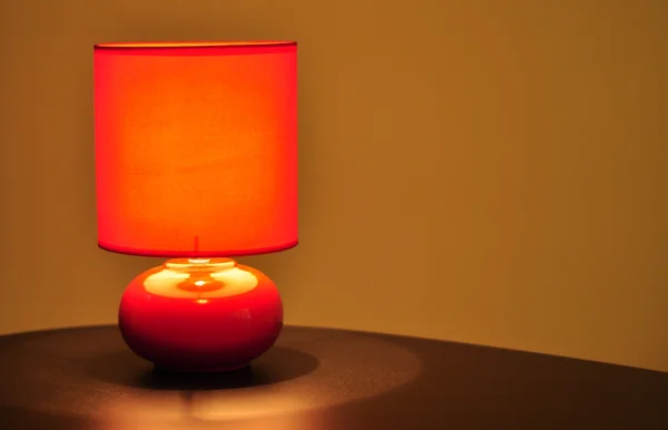 Red table lamp Stock Photo