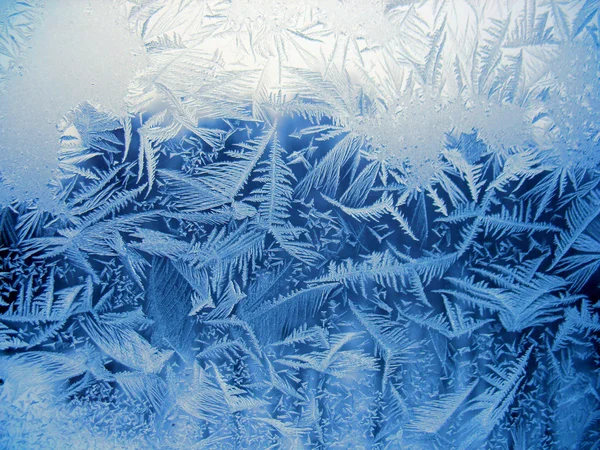 Modello neve sulla finestra invernale Foto Stock Royalty Free