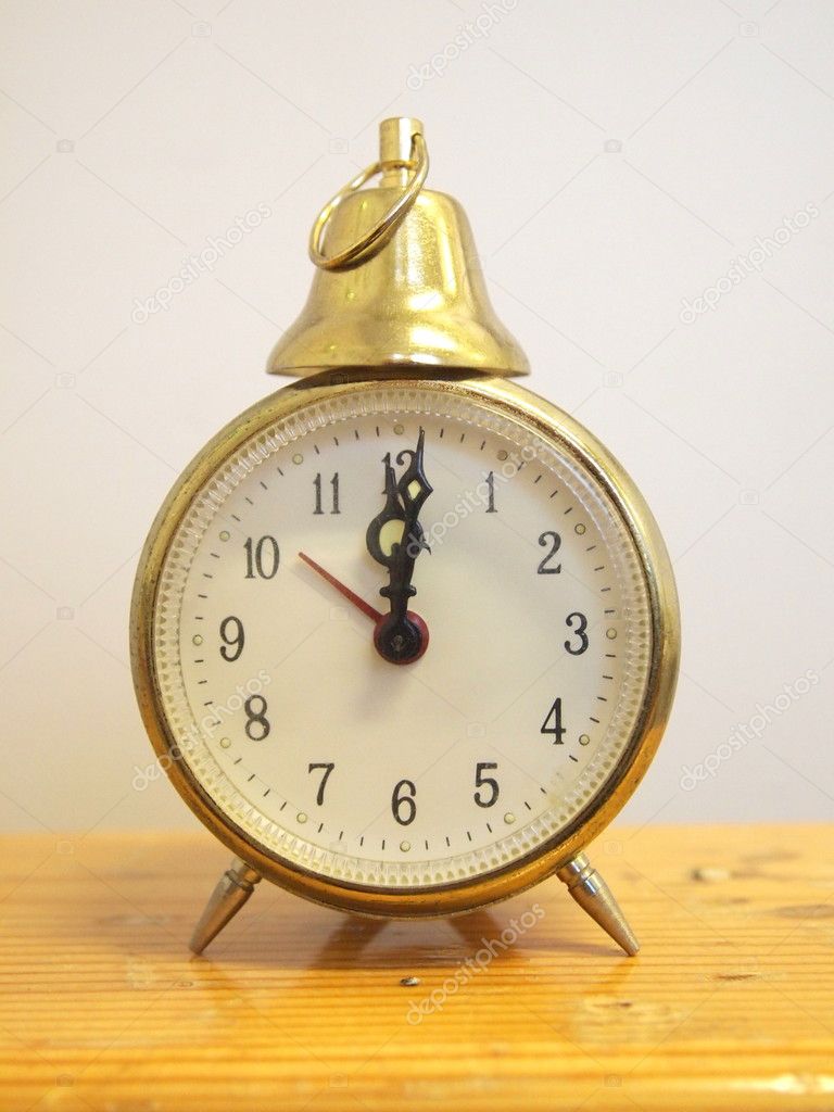 Vintage Alarm Clock isolated on white