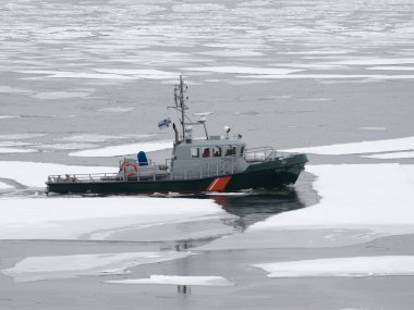 Transport ship in the frozen sea clipart