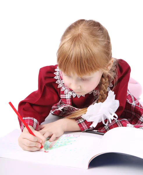 Girl draws in this album on a white background