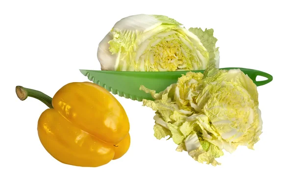 Овощи с зеленым ножом — стоковое фото