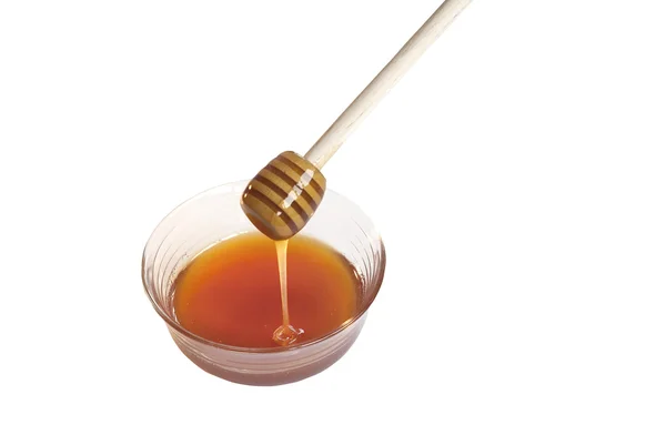 Ciotola di vetro con miele — Foto Stock