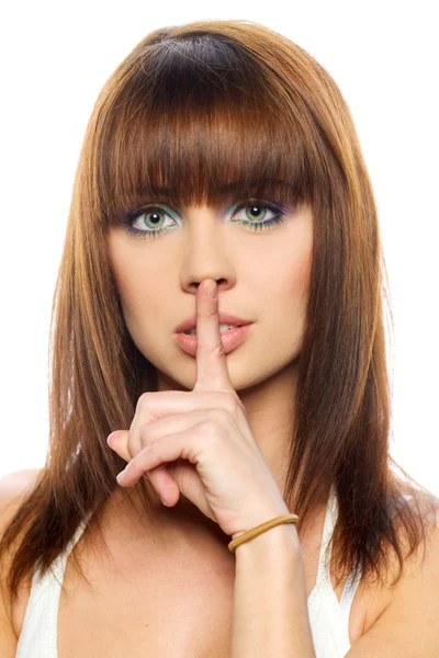 Secret - parmağını ağzına üzerine genç kız — Stok fotoğraf