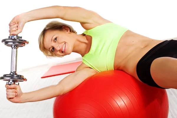 Mulher fazendo exercício de fitness Imagem De Stock