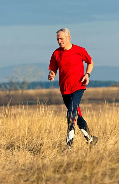 Starszy Biegacz Podczas Szkolenia Konkursu — Zdjęcie stockowe