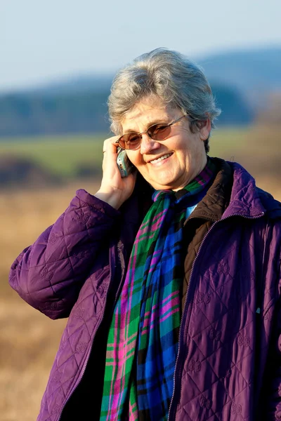 Senior Lady Cheerfully Call Someone — Stock Photo, Image