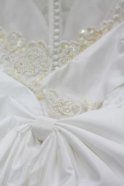 Detalhe de um vestido de casamento — Fotografia de Stock