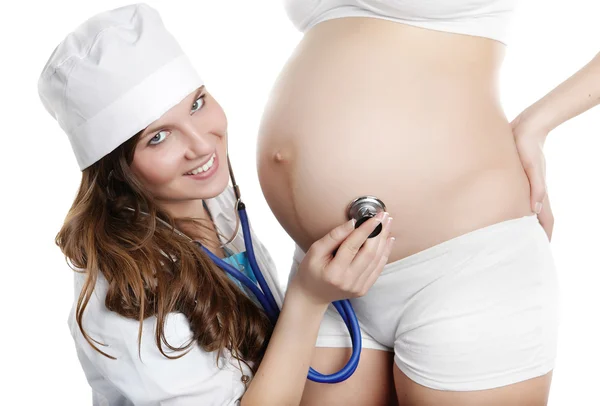Medico con donna incinta — Foto Stock