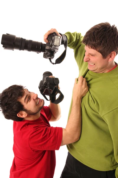 Zwei professionelle Fotografen kämpfen — Stockfoto