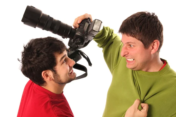 Två professionella fotografer kämpar — Stockfoto