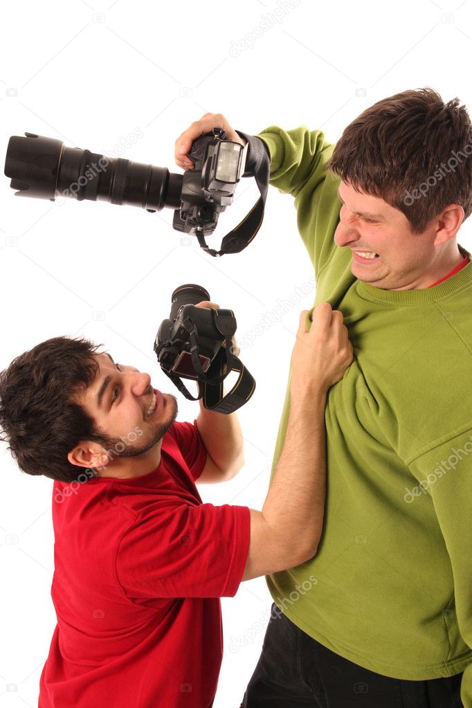 Two Professional photographers fighting