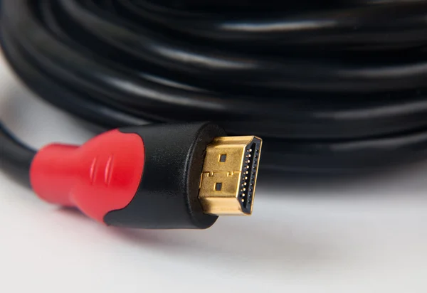 Hdmi Cable Enrollado Una Bola Zócalo Rojo —  Fotos de Stock