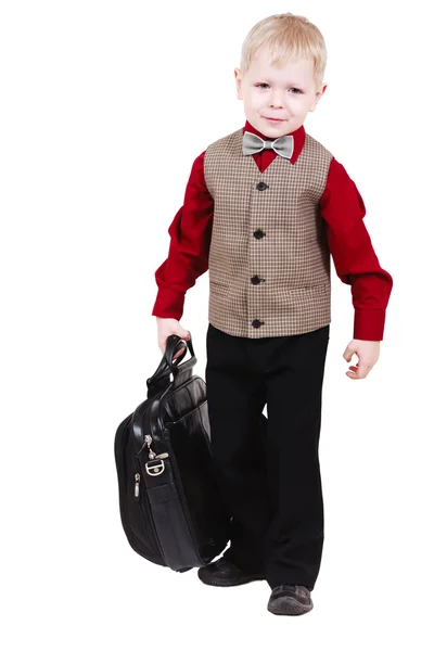 Kleiner Junge mit Koffer über Weiß — Stockfoto