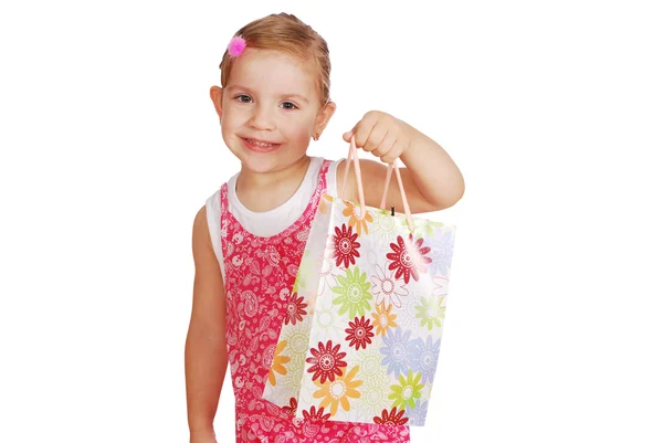 Küçük kız tutun alışveriş çantası — Stok fotoğraf