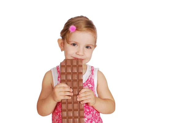 Beauty little girl with large chocolate — Stock Photo, Image