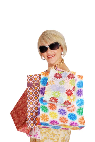 Žena s nákupní tašky a sluneční brýle — Stock fotografie
