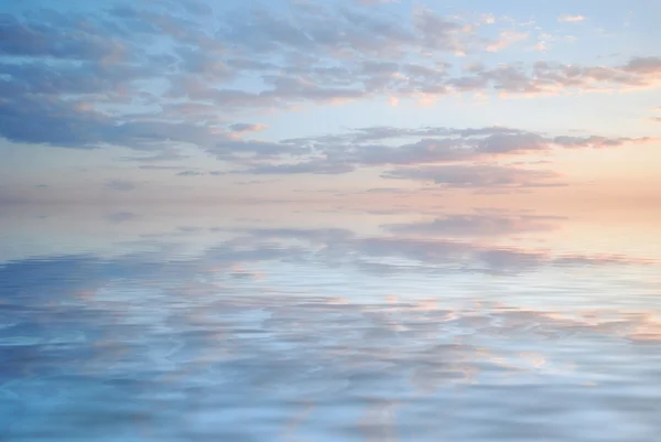 stock image Sky reflection in water background