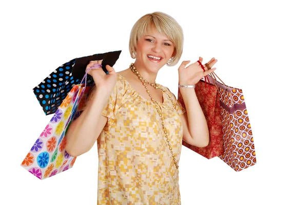 Gelukkige vrouw met boodschappentassen — Stockfoto