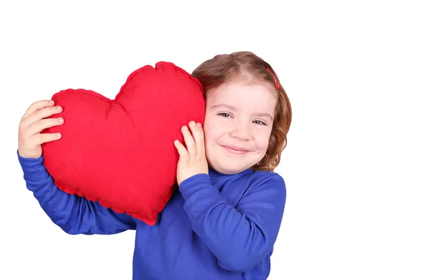 Happy little girl with heart — Stock Photo, Image