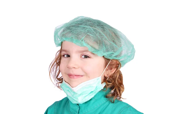 Mały doktor dziewczynka w zielonym mundurze — Zdjęcie stockowe