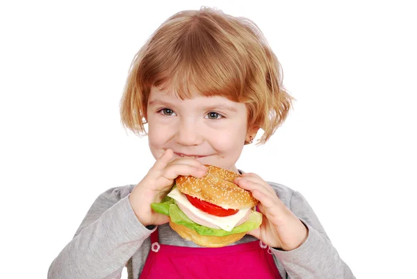Küçük kız holding sandviç — Stok fotoğraf