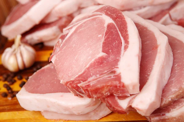 Slices of fresh pork Royalty Free Stock Images