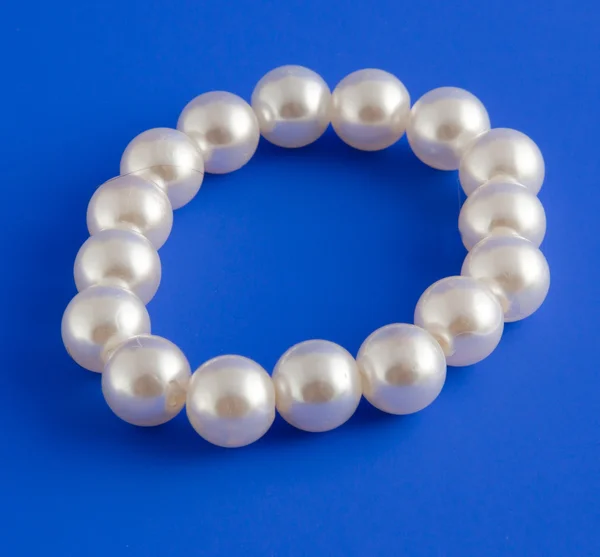 White Isolated Beads Blue Background Image — Stock Photo, Image