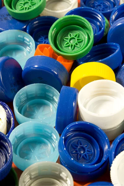 Tapas de plástico fondo —  Fotos de Stock