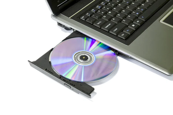 Φορητό υπολογιστή με φορτωμένο δίσκο dvd — Φωτογραφία Αρχείου