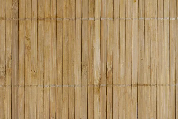 竹のボードのマットの背景 — ストック写真