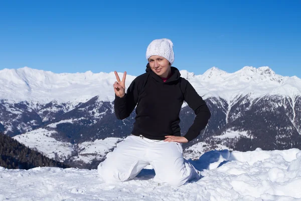 Relaxed Girl High Mountains Showing Peace Sign Stock Image