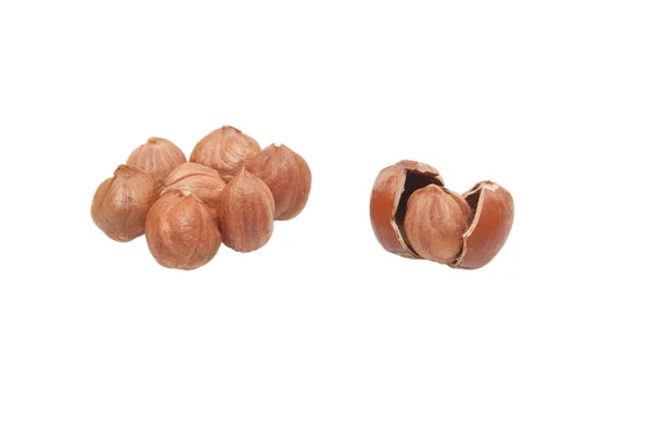 Stock image The cleared nuts a filbert near to a shell