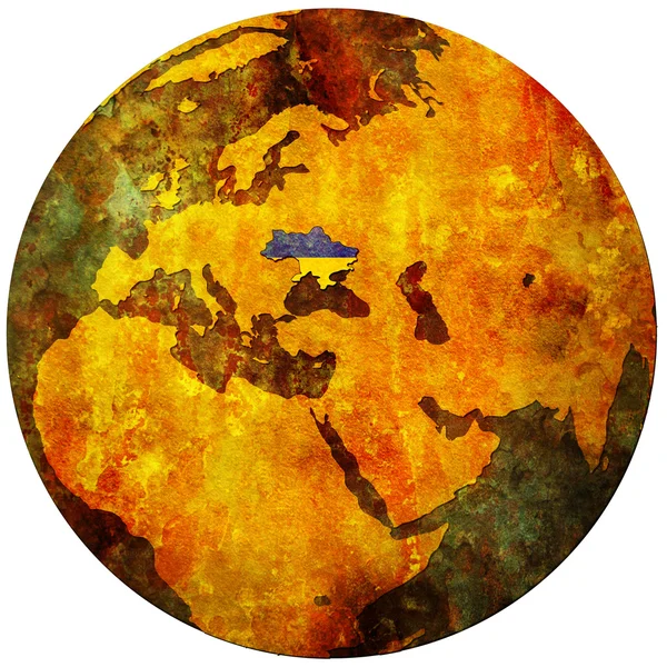 Ukraine flag on globe map — Stock Photo, Image