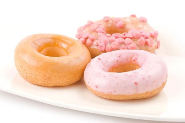 Lezzetli ve renkli donut plaka — Stok fotoğraf