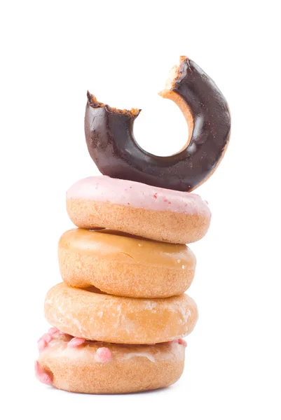 Stapel von bunten und leckeren Donuts — Stockfoto