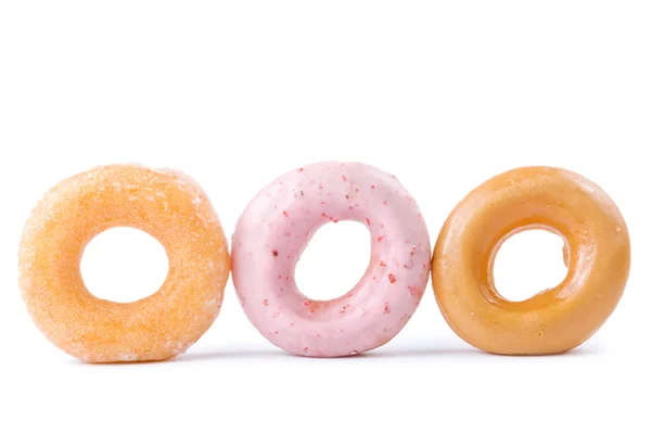 Colorido delicioso donut en una fila — Foto de Stock