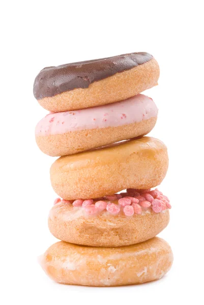 Stapel von bunten und leckeren Donuts — Stockfoto