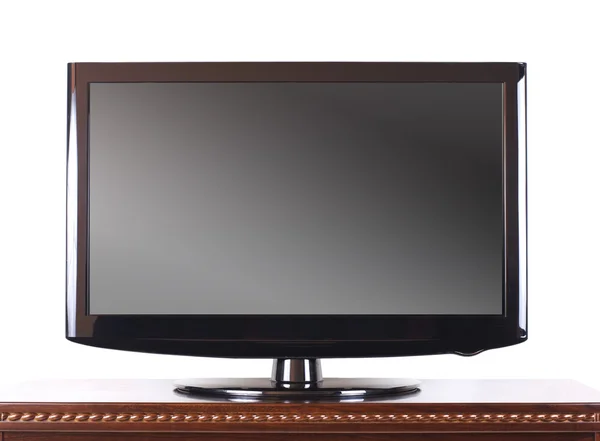 Moderne televisie op houten kast — Stockfoto