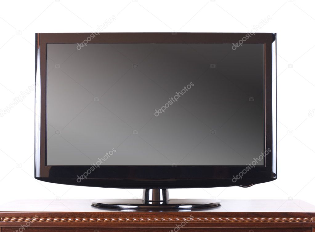 Modern television on wooden cabinet
