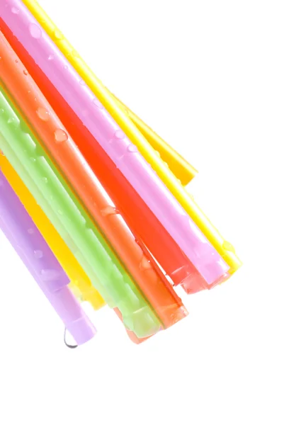 Drops and bunch of colorful straws — Stock Photo, Image