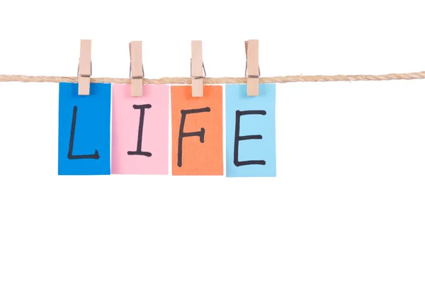 Liv, färgstarka ord hänga på rep — Stockfoto