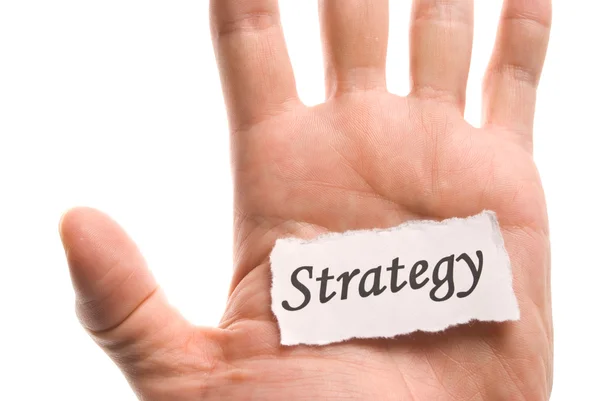 Strategy word in hand — Stock Photo, Image